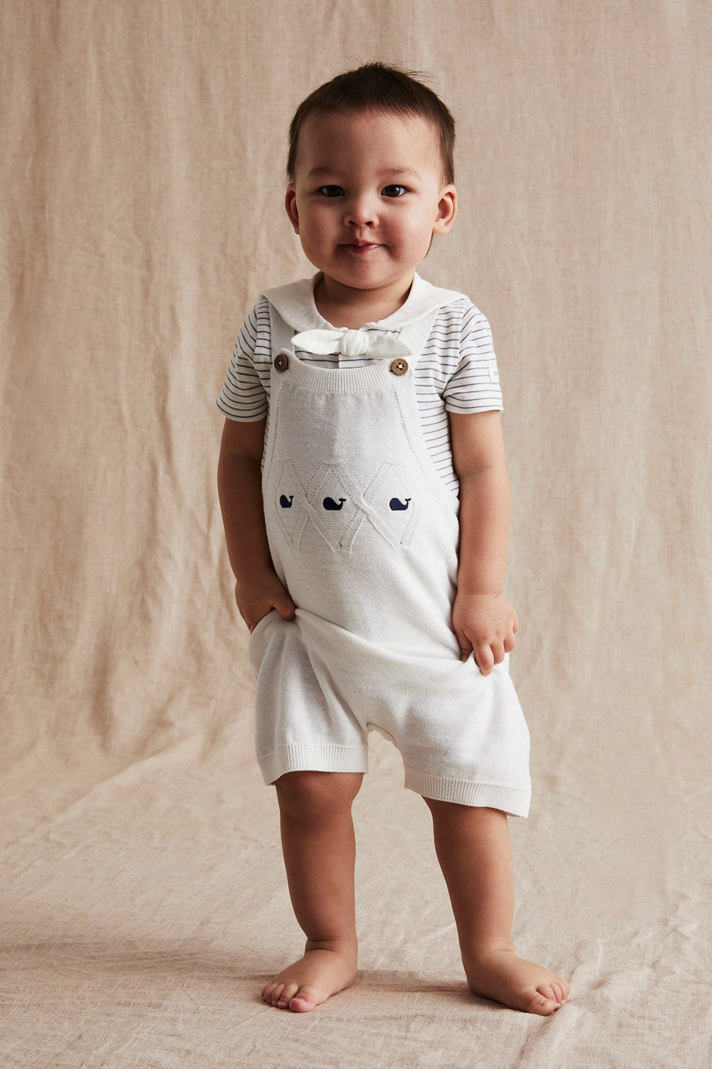 Baby white knitted whale dungaree shorts