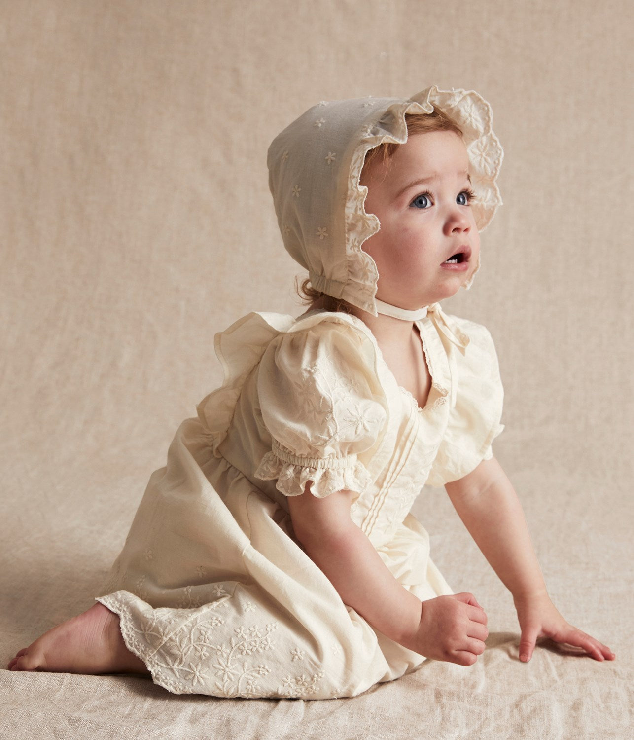 Baby white embroidered bonnet