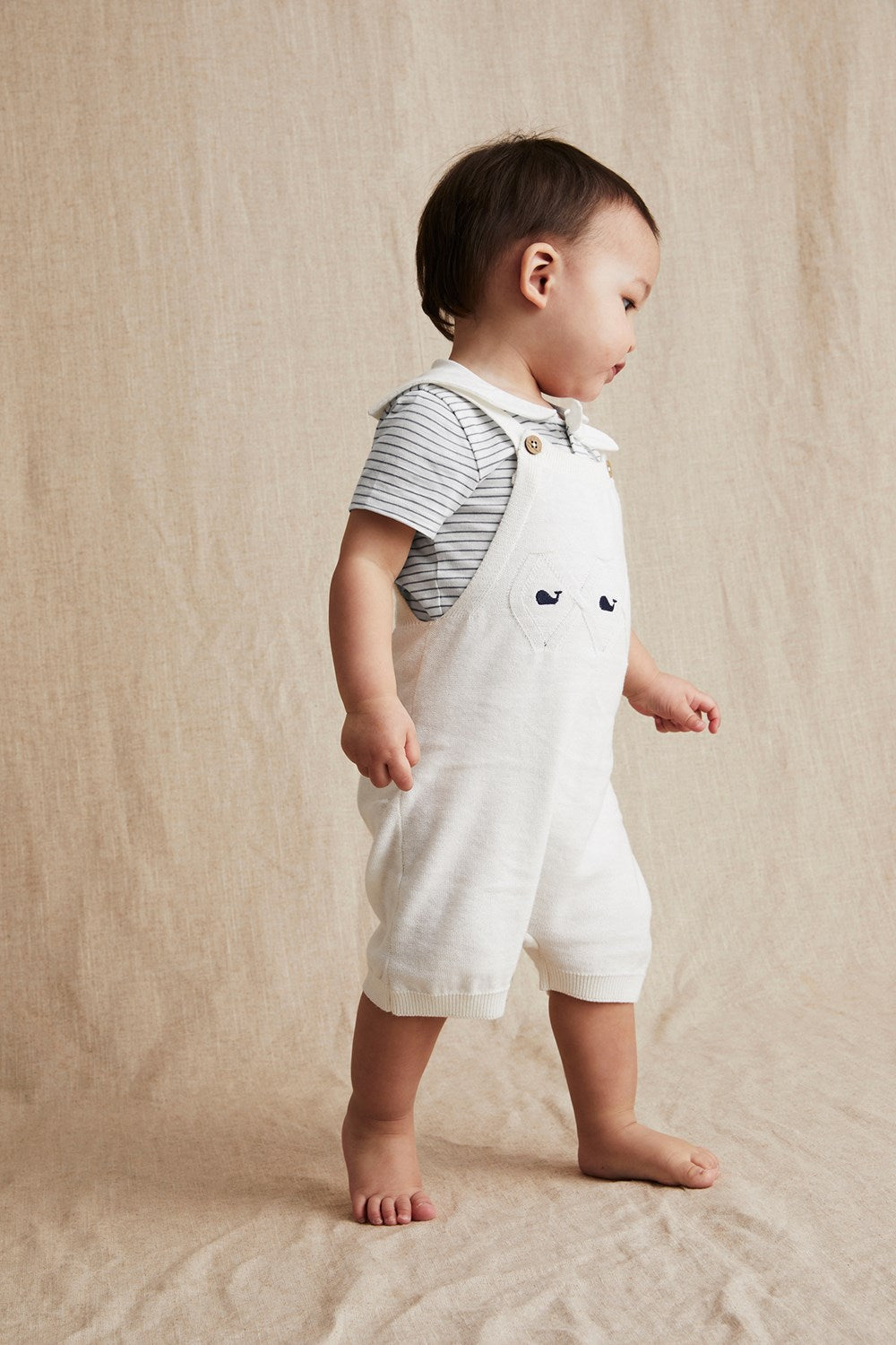 Baby white knitted whale dungaree shorts