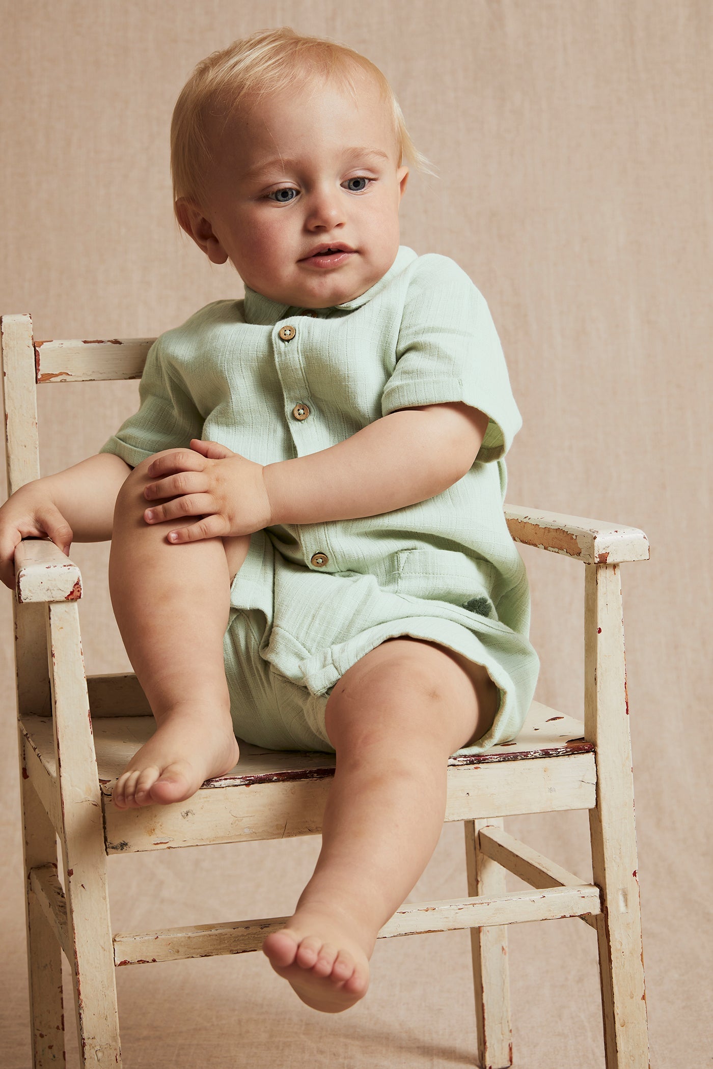 Baby green cotton muslin romper