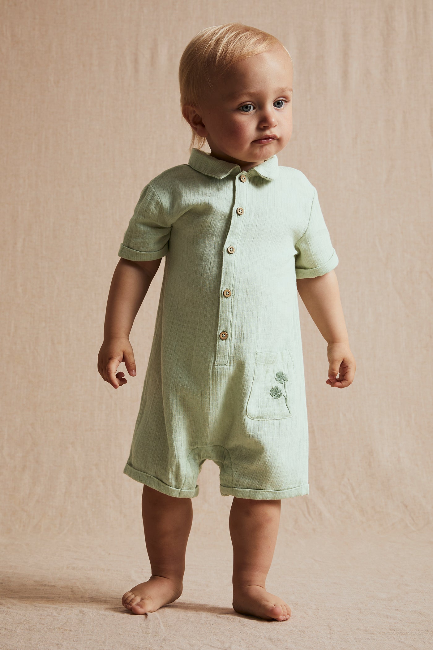 Baby green cotton muslin romper