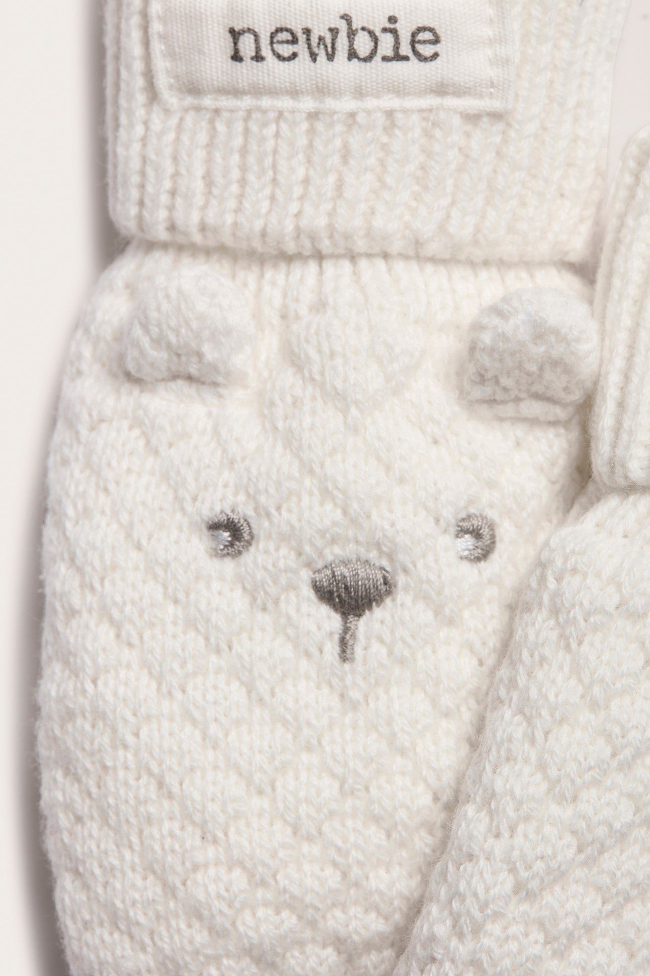 Baby white knitted thumbless bear-face mittens