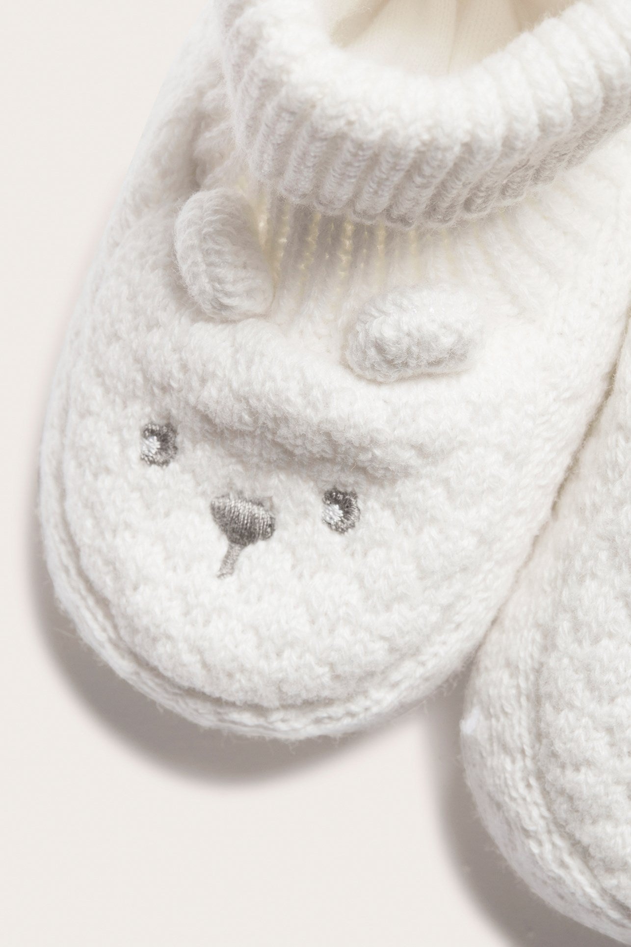 Baby white knitted bear-face booties