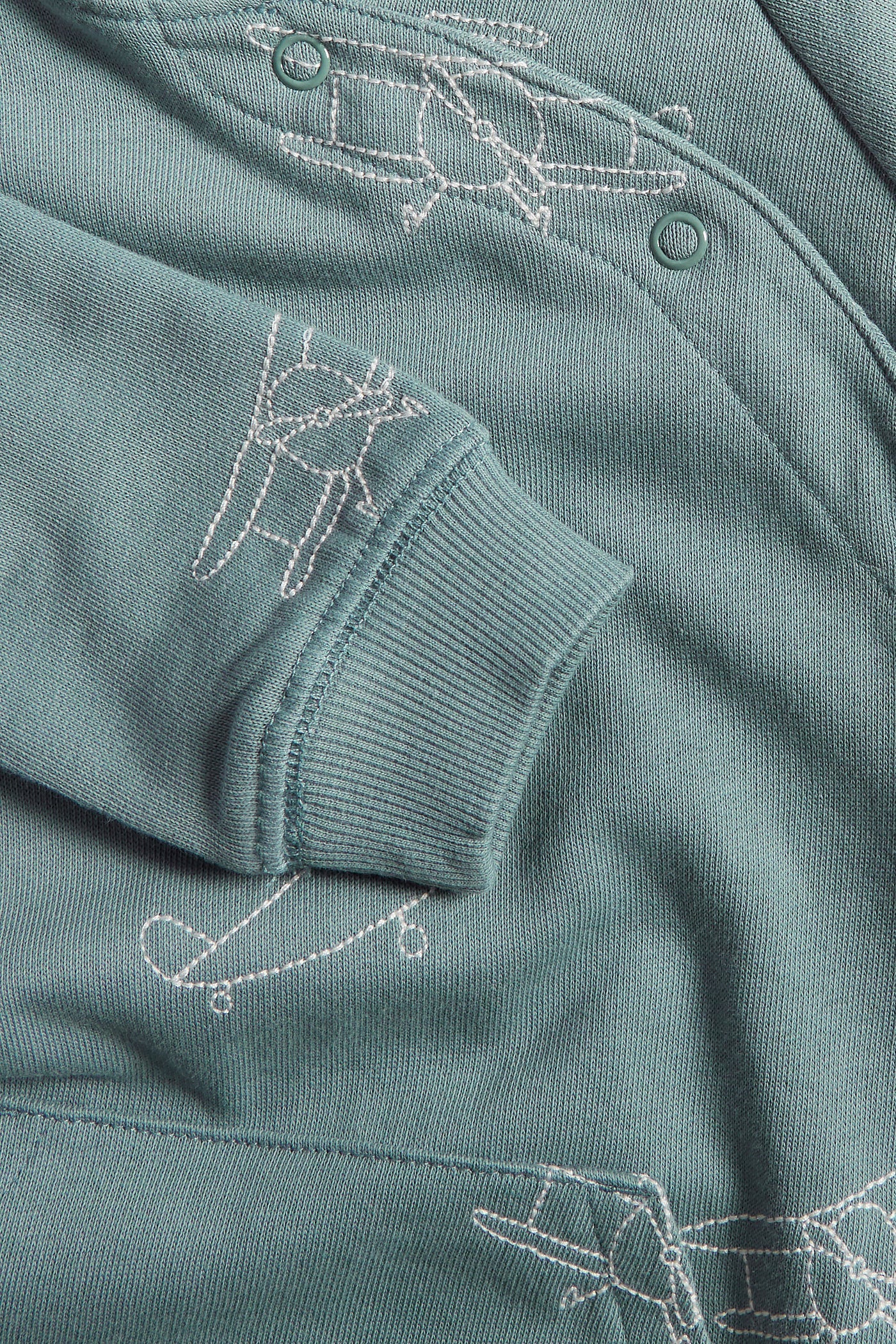 Baby turquoise airplane embroidered coverall