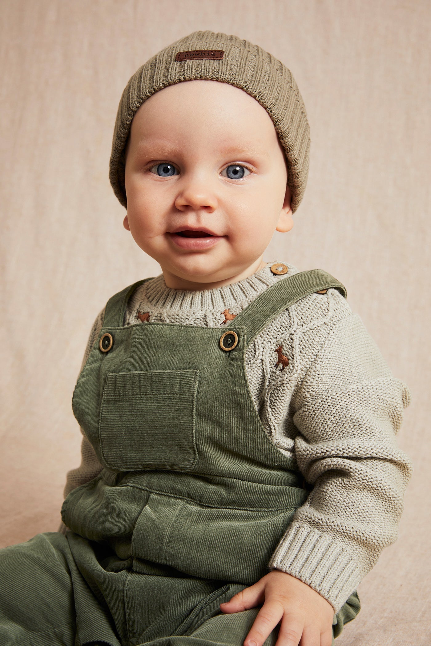 Baby green corduroy overalls