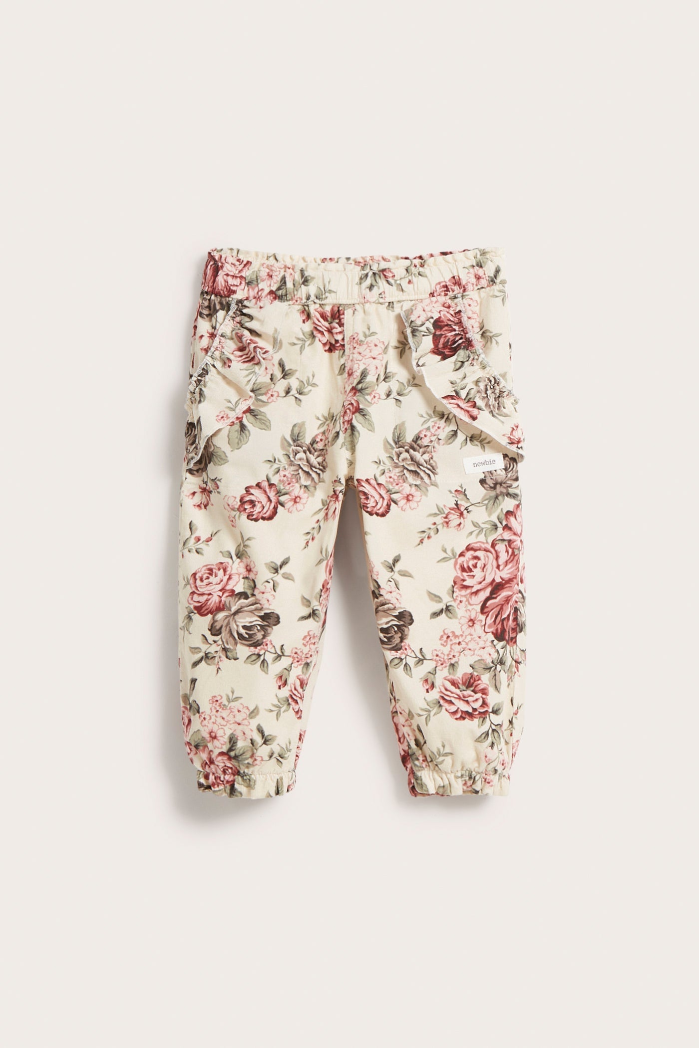 Baby beige rose patterned corduroy pants