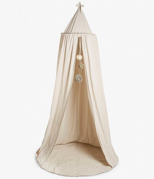 Beige reading tent with pom poms