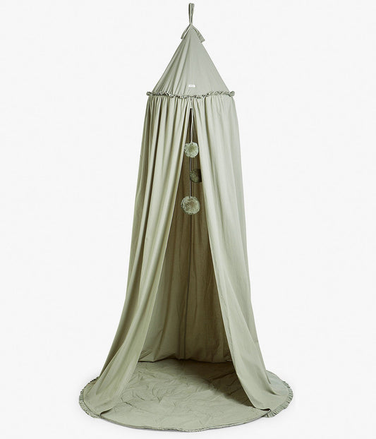 Green reading tent with pom-poms