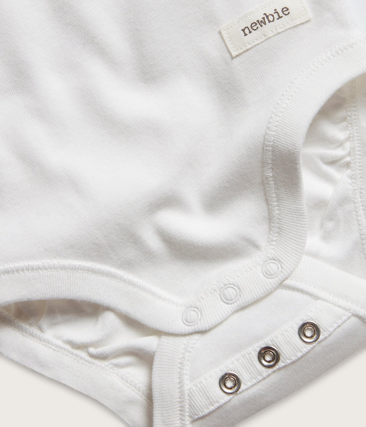 Baby white sleeveless bodysuit